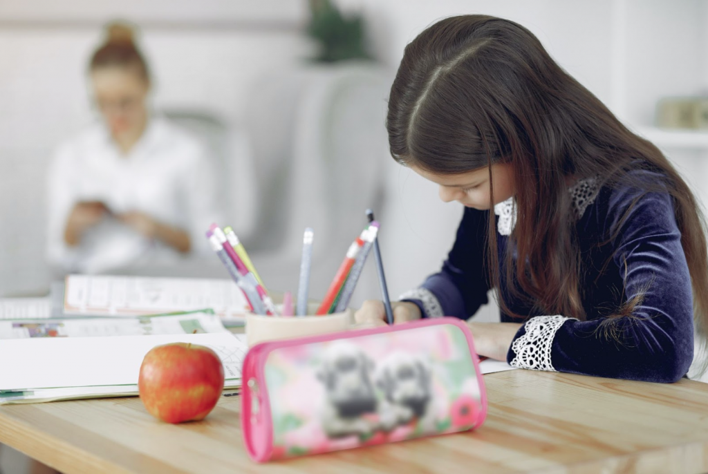 A girl doing international primary school homework